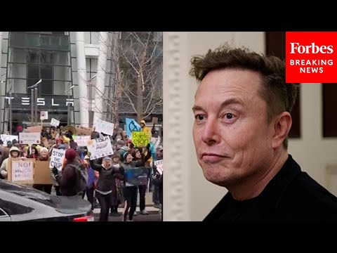 Anti-Elon Musk Protesters Gather Outside The Tesla Showroom At The Prudential Center In Boston, MA