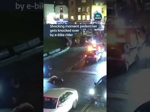 Shocking moment pedestrian gets knocked over by e-bike rider